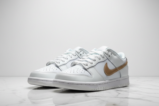 Nike Dunk Low (GS) editorial render, both shoes side by side on white marble